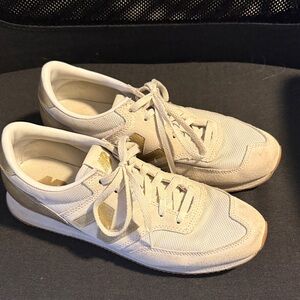New Balance Gold and Cream Sneakers